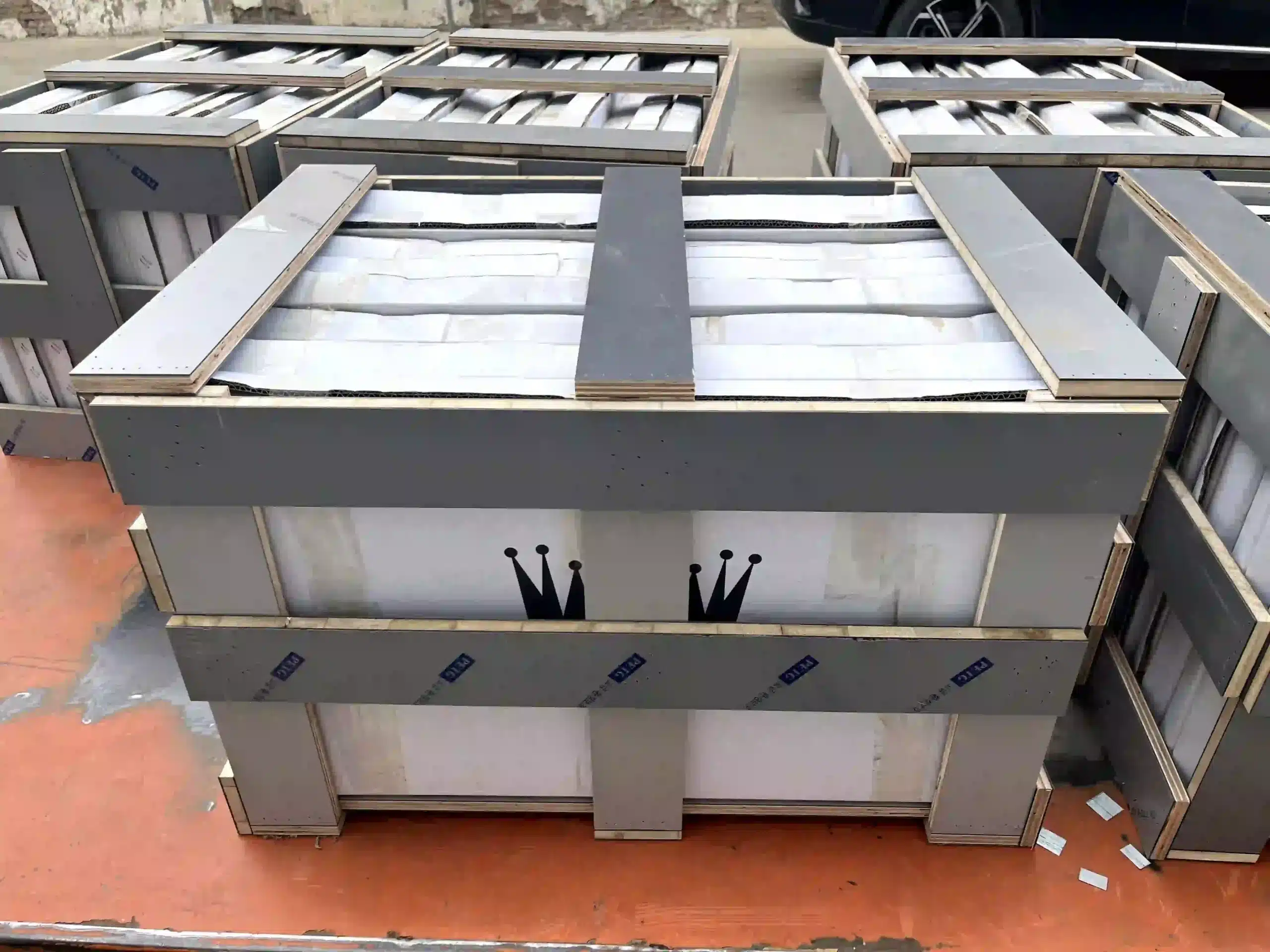 Lead Time Planning: Working Backwards from a 4-6 Week Delivery Promise 2 Wooden crates strapped and ready for export container loading