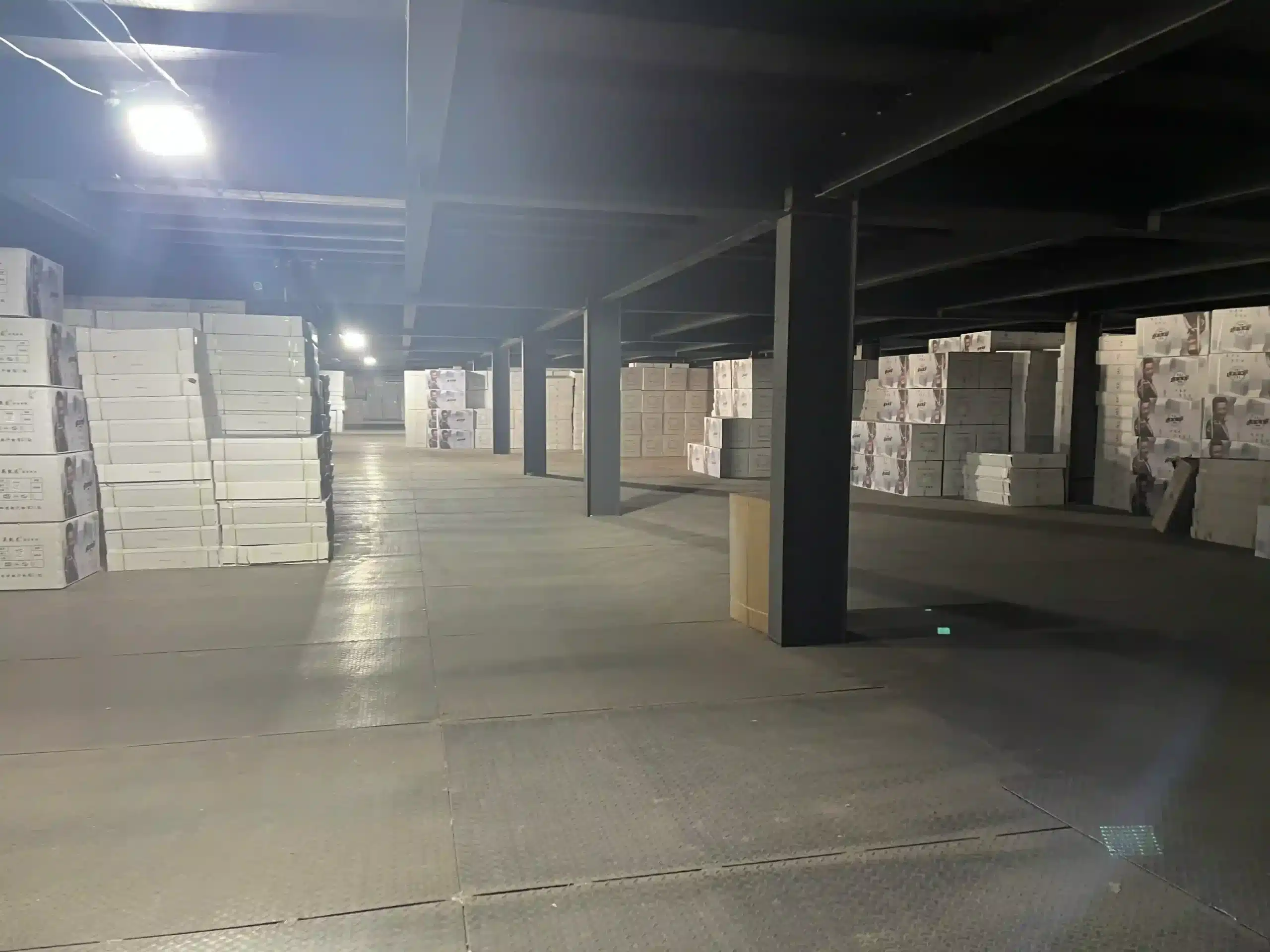 Finished goods storage in a bathroom cabinet factory warehouse