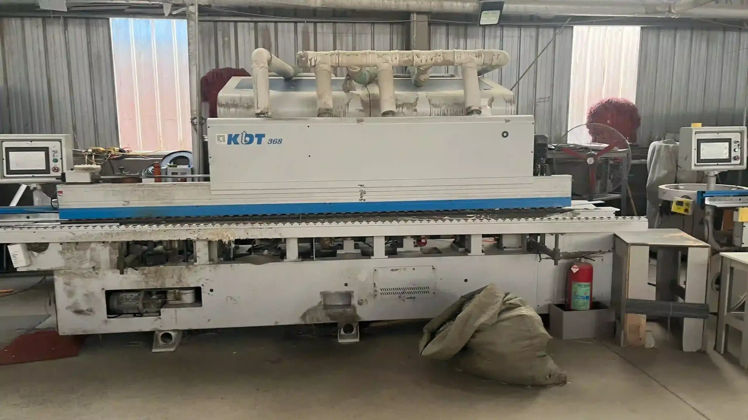 Verifying Certification Claims: What a Real ISO 9001 Factory Audit Looks Like 1 edge banding machine in a bathroom vanity factory workshop