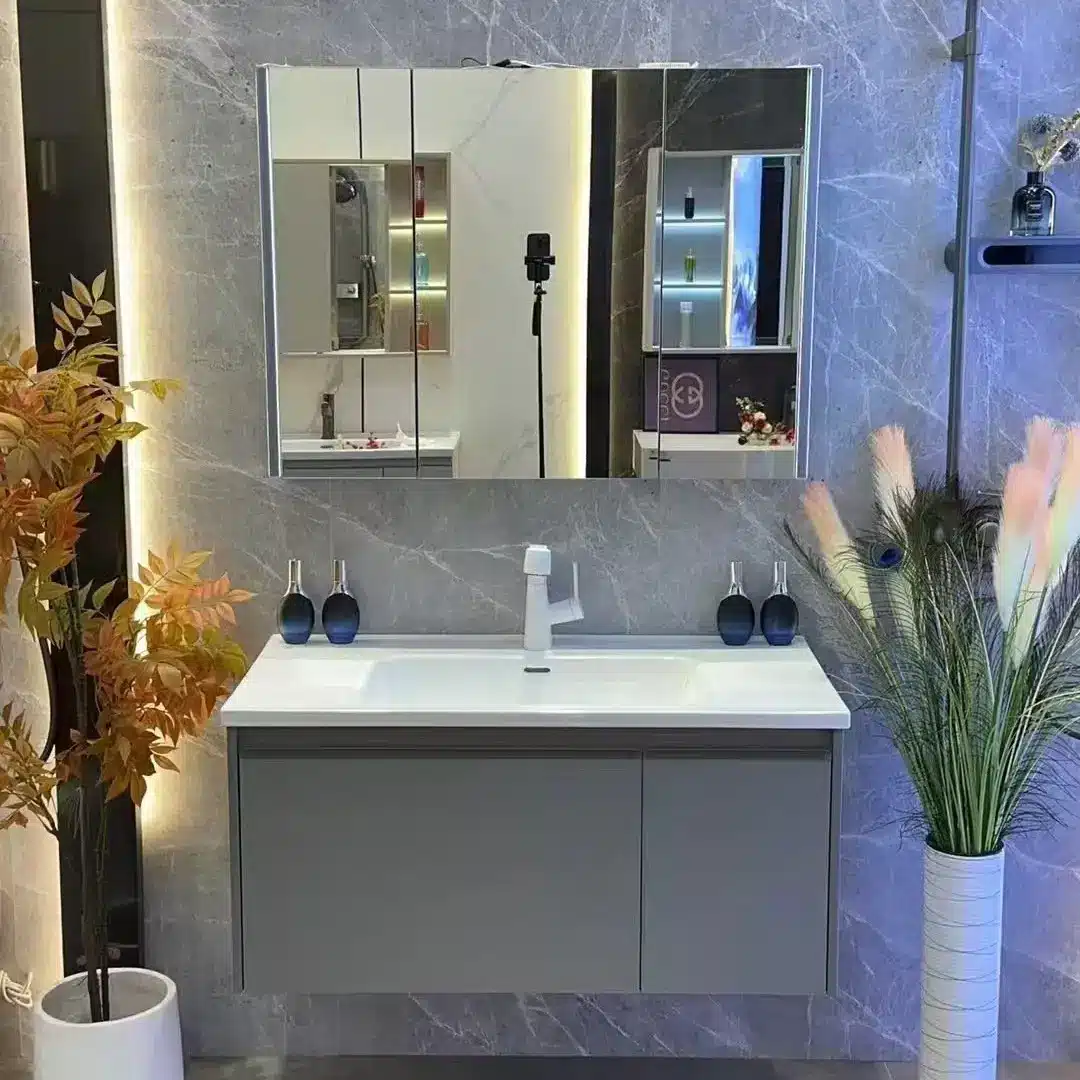 Gray wall-mounted bathroom vanity with white countertop