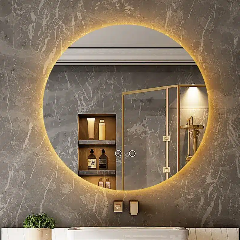 Mirror Thickness Matters: 3mm vs 4mm vs 5mm for Commercial Bathroom Mirrors 1 Round LED backlit bathroom mirror with adjustable lighting above a hotel vanity