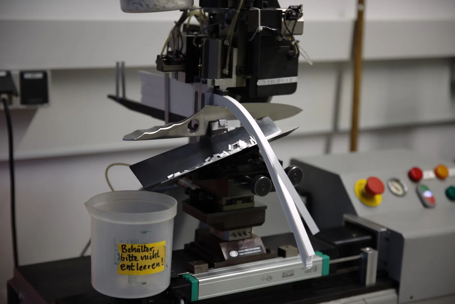 Soft-close damping mechanism test rig for bathroom vanity drawers